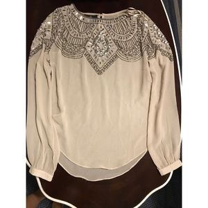 Nude, sheer shirt